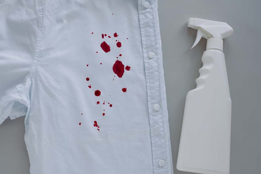 A shirt with blood stains on the front